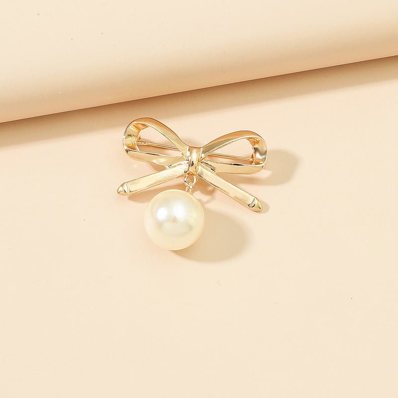 women--bow-brooch