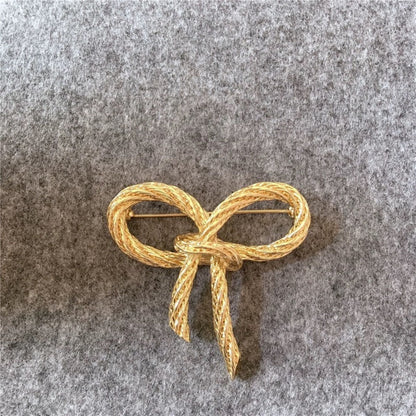 women--bow-brooch