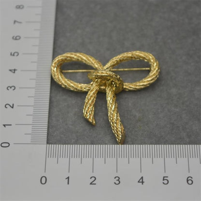 women--bow-brooch