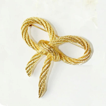women--bow-brooch