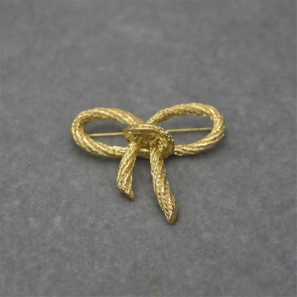 women--bow-brooch