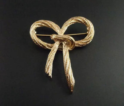 women--bow-brooch