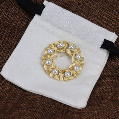 women-Jeweley-brooch-gold