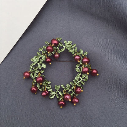 women--brooch-plants