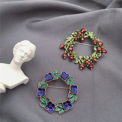 women--brooch-plants