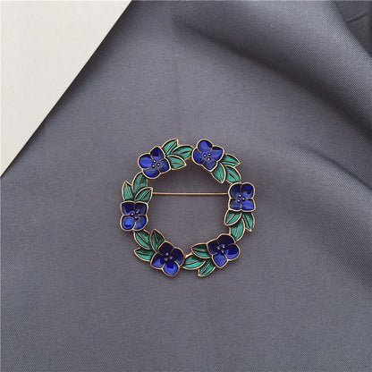 women--brooch-plants