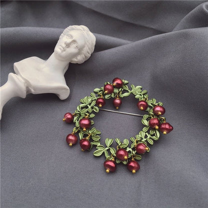 women--brooch-plants