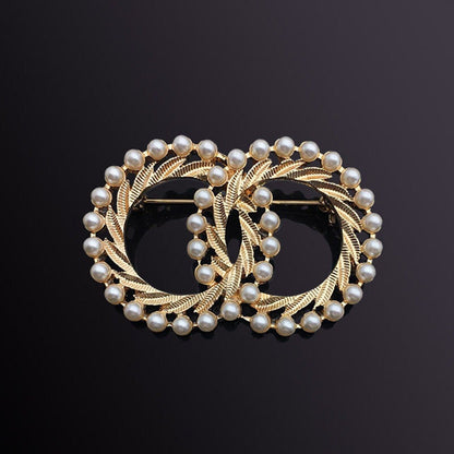 women--brooch-gold