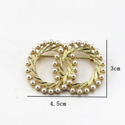 women--brooch-gold