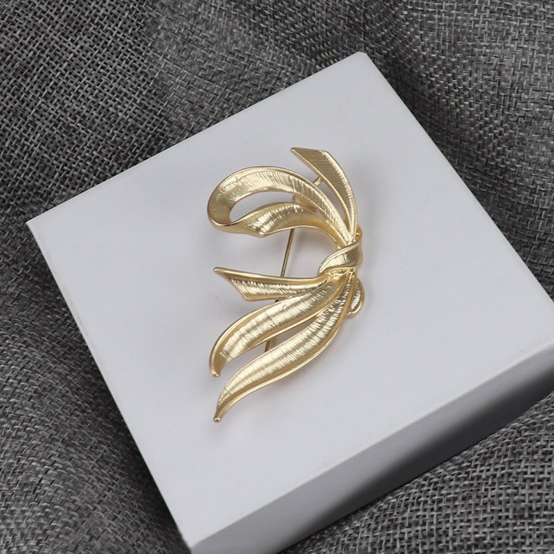 women--bow-brooch