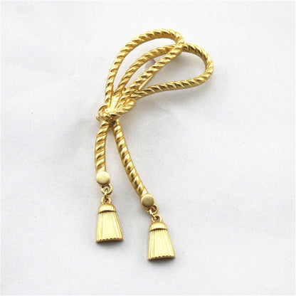 women--bow-brooch