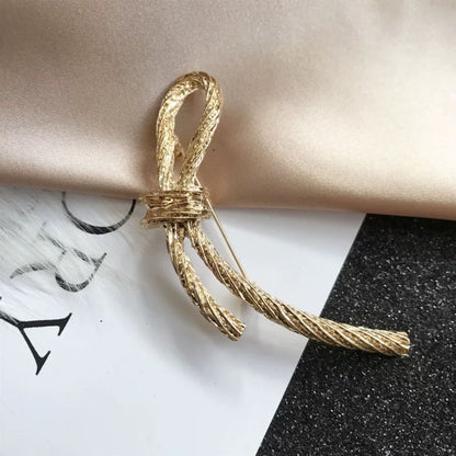 women--bow-brooch