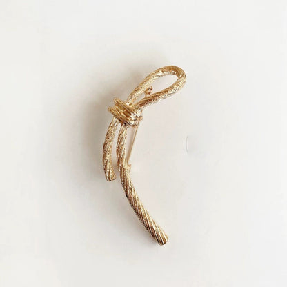 women--bow-brooch