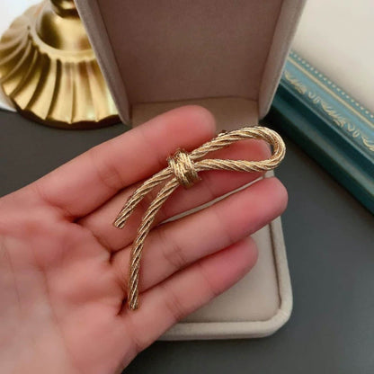 women--bow-brooch