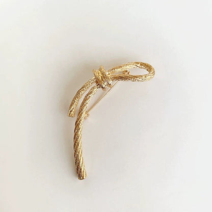 women--bow-brooch