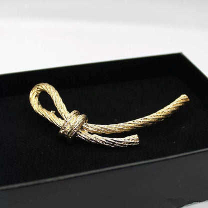 women--bow-brooch