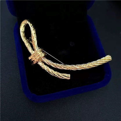 women--bow-brooch