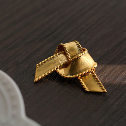 women--bow-brooch