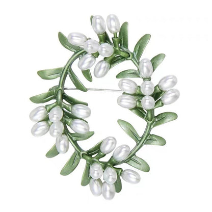 women--brooch-plants