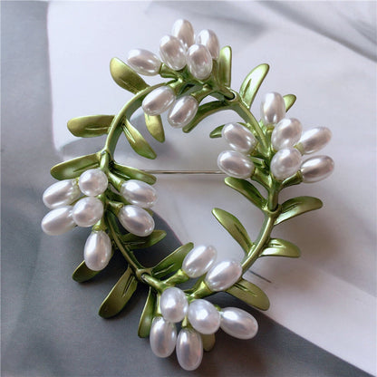 women--brooch-plants