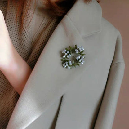 women--brooch-plants