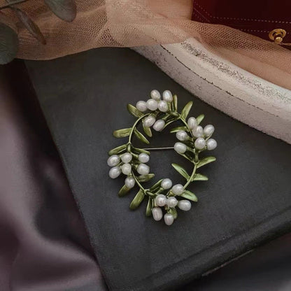 women--brooch-plants