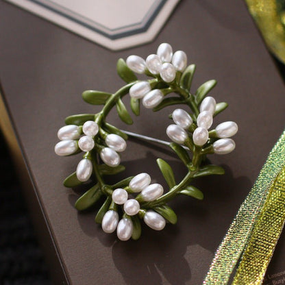 women--brooch-plants